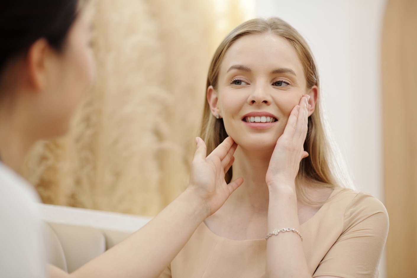 Young woman thinking about preventative botox